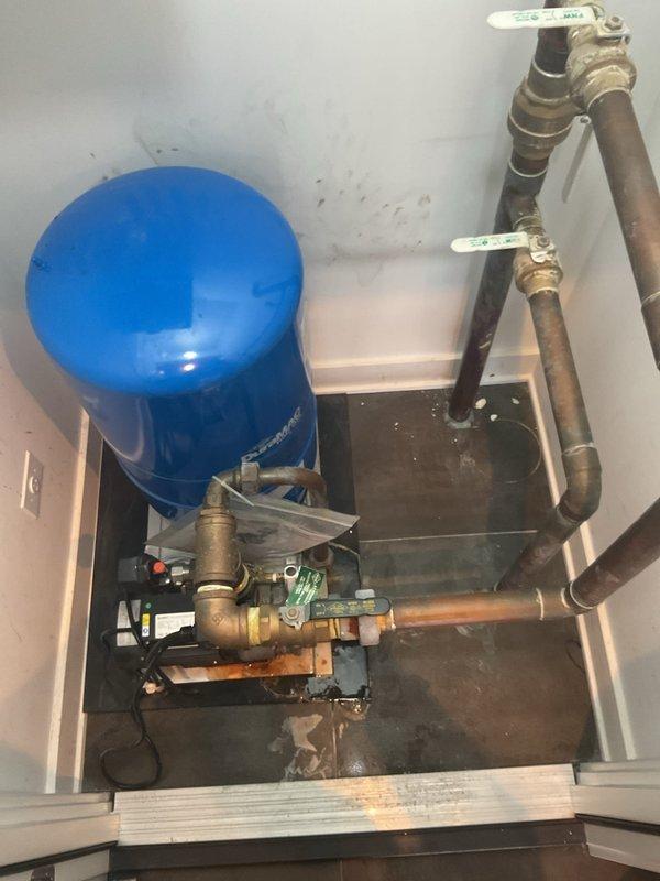 Inspected commercial water treatment system with non-functional booster pump. Identified pump failure as cause of low building water pressure. Recommended complete replacement of existing pump unit to restore proper system operation and pressure levels.