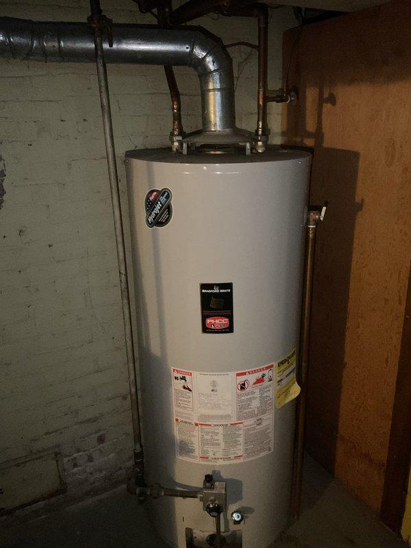 Inspected 75-gallon water heater exhibiting leakage from the bottom. Visual assessment confirmed unit is beyond its service life, with active leaking requiring replacement. Recommended installation of new water heater to prevent potential water damage and restore reliable hot water service.