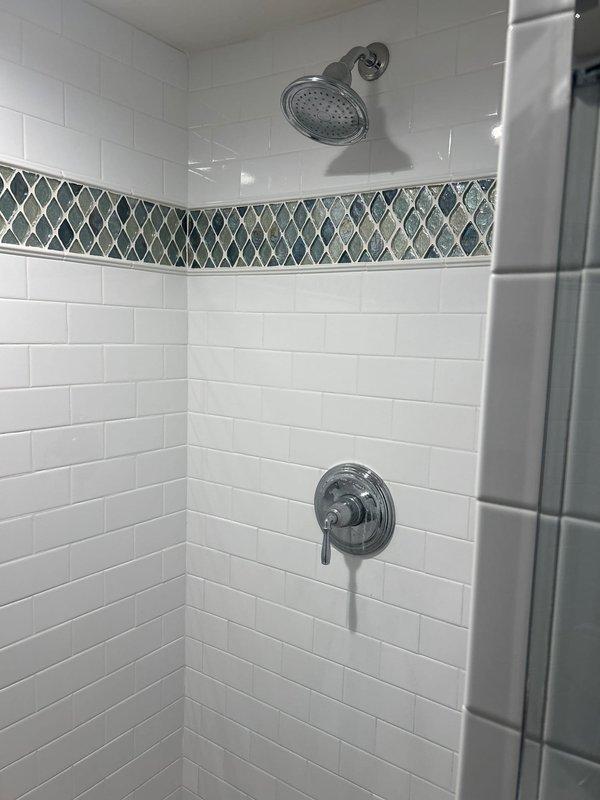 Inspected and repaired multiple shower fixtures experiencing continuous dripping, resolving leak issues through cartridge replacement and seal adjustment. Addressed bathroom faucet with low water pressure by cleaning aerator and removing mineral deposits, restoring proper flow. Additionally, cleared kitchen sink drain obstruction and sealed leaking tub base in secondary bathroom.
