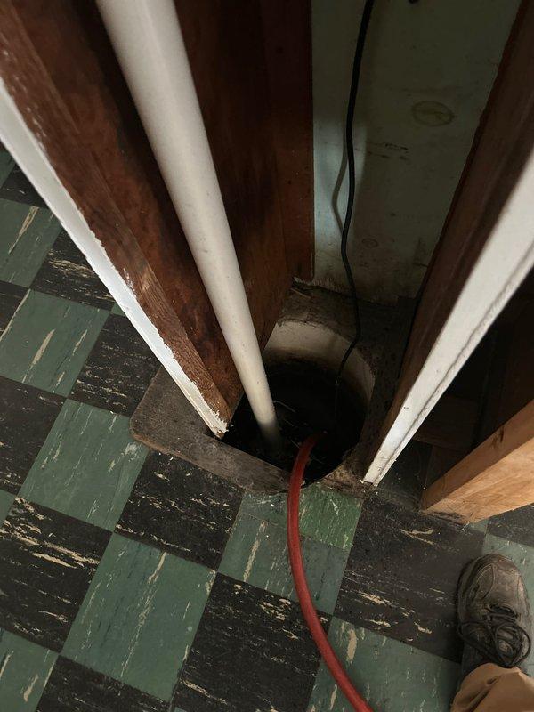 Performed annual VIP maintenance on A.O. Smith water heater system, including inspection of expansion tank, copper/PVC connections, and drainage components. Checked all plumbing connections for leaks, verified proper system pressure, and examined floor access point where utility pipes pass through to ensure proper sealing and function.