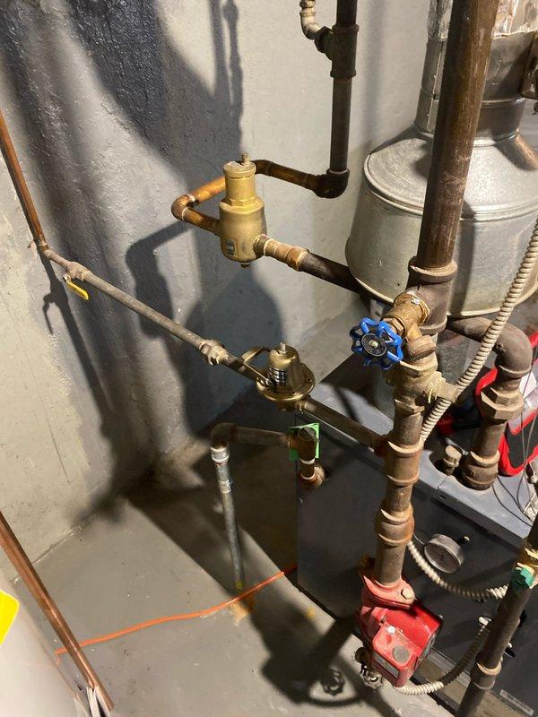 Completed service call regarding customer-reported concerns about temperature fluctuations and potential leak in boiler system. Inspected Bock heating unit, pressure relief valve, and associated copper piping connections. Serviced the red circulation pump and verified proper operation of the blue handle valve controlling water flow. System now functioning within normal parameters; advised customer to monitor temperature as weather warms.