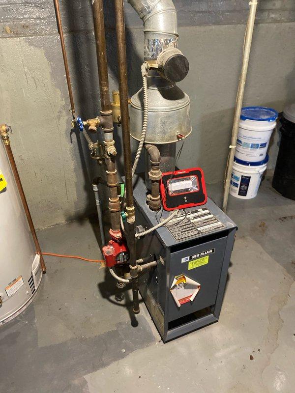Completed service call regarding customer-reported concerns about temperature fluctuations and potential leak in boiler system. Inspected Bock heating unit, pressure relief valve, and associated copper piping connections. Serviced the red circulation pump and verified proper operation of the blue handle valve controlling water flow. System now functioning within normal parameters; advised customer to monitor temperature as weather warms.