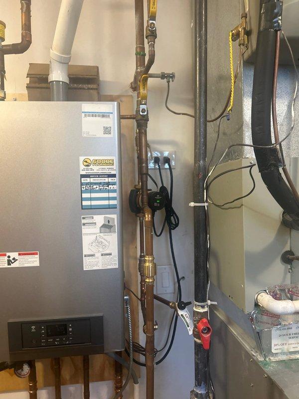 Responded to service call regarding boiler with recurring error code 501 causing intermittent hot water loss and requiring constant resets. Performed diagnostic inspection of the boiler system, including copper pipe network, circulation pump, and connected components. Examined digital thermostat settings and operation to resolve the persistent error condition.