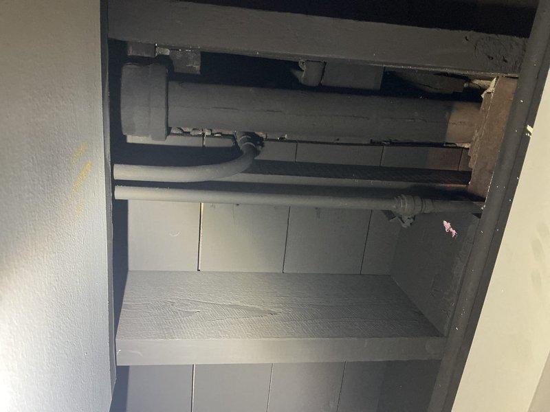 Responded to service call regarding deteriorated drainage structure. Inspected circular drainage pipe showing significant concrete deterioration with extensive cracking, flaking, and water pooling at bottom. Also examined utility access area with PVC piping and documented current condition with photographs for further assessment.