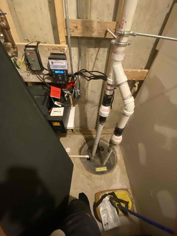 Responded to emergency service call for a burst pipe in the basement utility area. Located and excavated the damaged pipe section which showed significant water leakage and surrounding soil saturation. Replaced the compromised pipe section and installed a new PVC drainage system with connections to the floor basin, along with a digital pump controller to prevent future flooding issues.