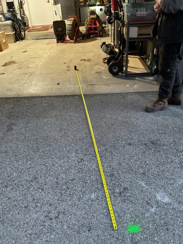 Responded to recurring sewer backup in one area of 8-year-old home. Performed diagnostic measurements (127-134 inch range) to locate blockage point in the sewer line, then successfully cleared obstruction to restore proper drainage function.