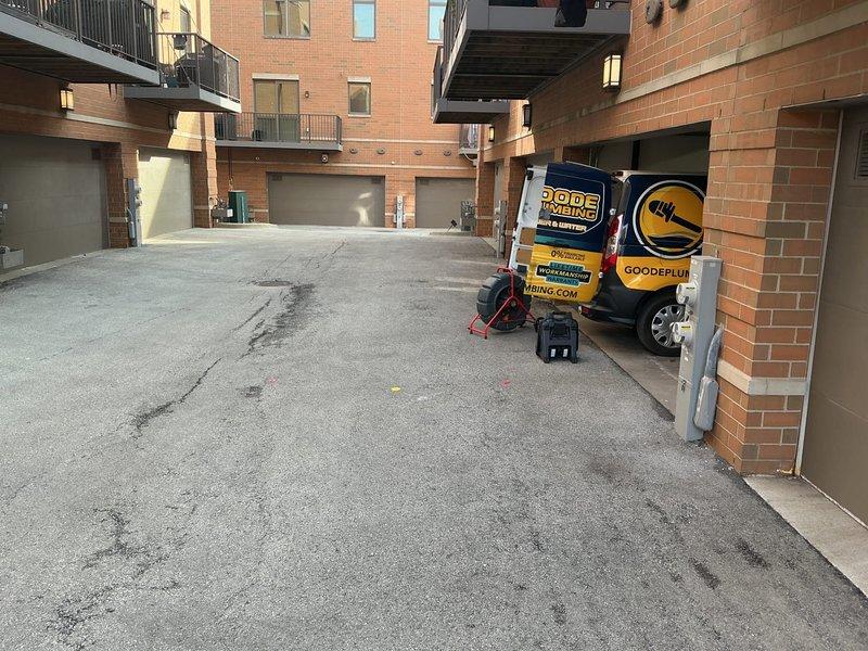 Attended property to assess and provide estimate for removal of an 11-foot belly in sewer line. Took detailed photographs of the work area including the courtyard access point and garage workspace to document site conditions for proper equipment and resource planning.