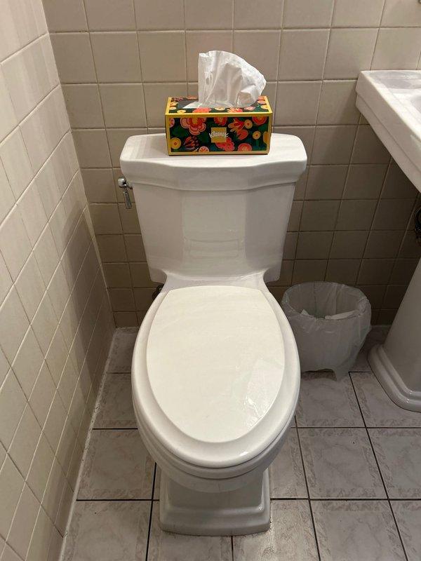 Responded to service call for toilet not filling properly. Upon inspection, removed tank lid to examine internal components, revealing a malfunctioning fill valve with significant mineral buildup. Cleaned and adjusted the fill valve assembly, replaced worn flapper, and verified proper water level and flush operation before completing the service.
