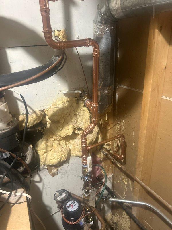 Conducted water leak investigation in response to customer's report of unusually high water bills. Performed comprehensive inspection of plumbing system, including copper supply lines, PVC drainage pipes, and all visible connection points. Assessment revealed properly functioning infrastructure with no visible signs of leakage, damage, or deterioration at this time.
