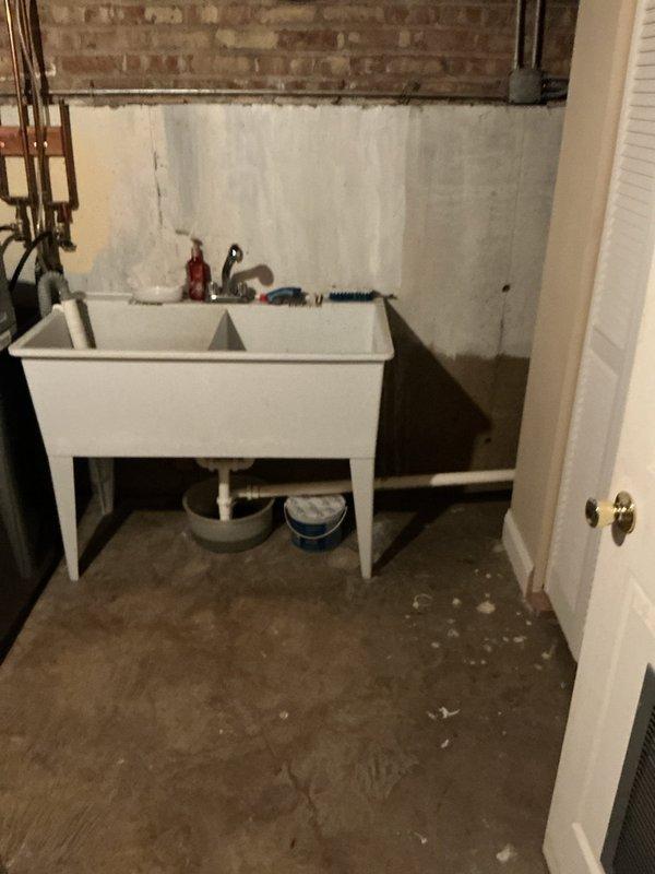 Responded to service call for multiple drainage issues in a 60-year-old residence, including a clogged upstairs toilet, bathtub, and basement drain. Performed comprehensive drain cleaning on all affected fixtures, identifying root intrusion in the main stack as the primary cause of widespread clogs. Successfully cleared all blockages and restored proper drainage functionality throughout the home.