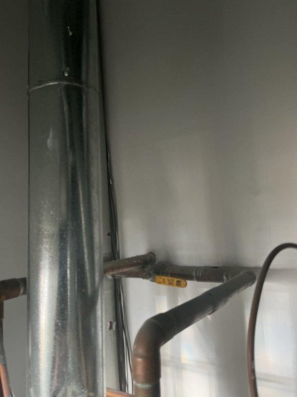 Removed and replaced existing 2004 Rheem 75-gallon gas water heater which was no longer providing hot water. Installed new 75-gallon water heater with drain pan and circulation pump according to manufacturer specifications. Completed proper venting connections and verified all plumbing connections for leaks and proper operation before departure.