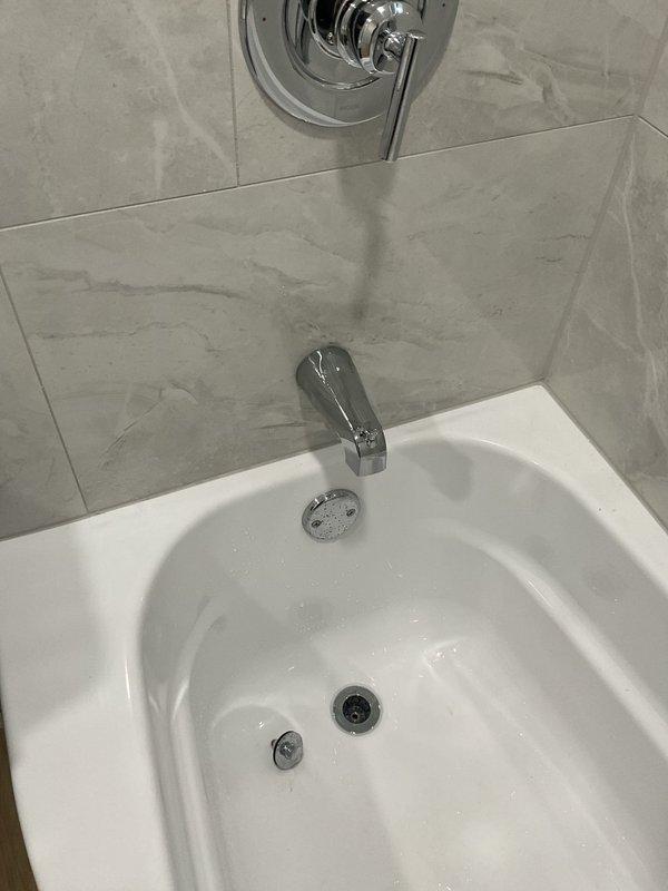 Completed scheduled hydro-jetting service on main sewer line from catch basin to city main to address potential blockages and facilitate camera inspection for pipe integrity assessment. Inspection revealed no significant cracks or structural issues requiring immediate repair. Additionally, examined bathroom tub faucet leak and determined replacement of valve cartridge would resolve the issue.