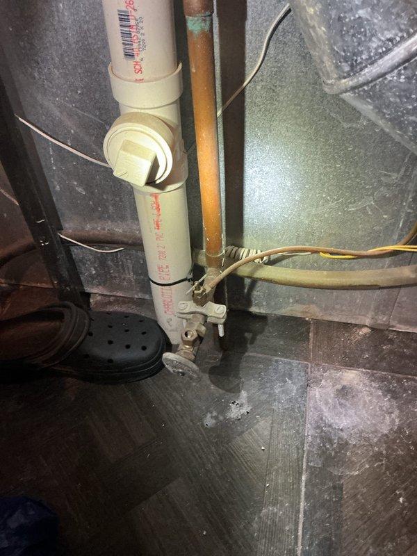 Completed comprehensive plumbing service addressing kitchen sink regrouting to correct improper setting, augered main sewer line to ensure proper drainage, replaced non-compliant dishwasher drain piping to meet inspection requirements, and replaced cracked bathroom sink bowl. Inspected water heater system including tankless unit and standard tank, verifying all connections and pressure readings were within normal operating parameters.