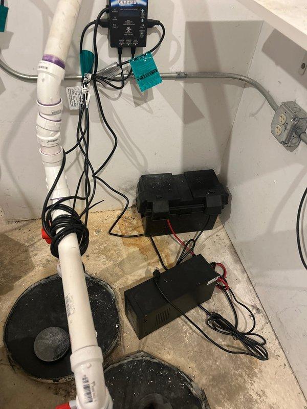Inspected and evaluated existing sump pump system with Ion Genesis controller, documented current conditions showing 2.3" water level reading. Scheduled return visit to install 35 ACI controller and high water switch to enhance system reliability and provide additional protection against potential basement flooding.