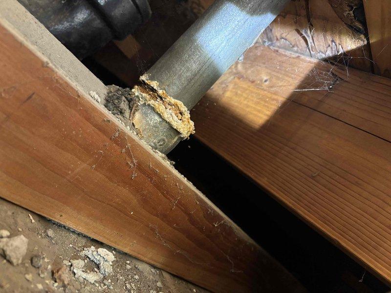 Repaired a pipe with puncture damage caused by previous contractor's work. Inspected the affected area, revealing significant corrosion at connection points. Restored proper function by replacing damaged section and securing joints, preventing further water leakage after temporarily shut-off water had been restored.