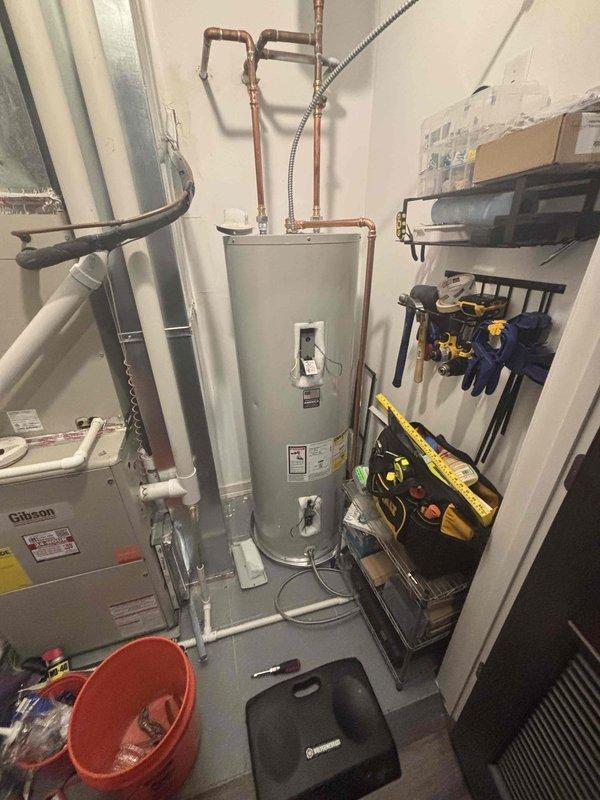 Installed new water heater per warranty service requirements, but system is not delivering hot water to bathroom shower and lavatory fixtures. Kitchen sink experiences significant delay in hot water delivery. Visual inspection performed and documented with photos of installation and water temperature testing.