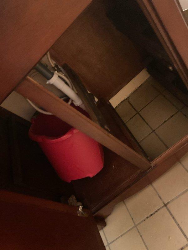 Responded to service call for multiple slow drains affecting kitchen sink, bathroom sink, and tub. Inspected bathroom sink plumbing and under-sink cabinet area to diagnose drainage issue. Successfully cleared blockage in all affected fixtures, restoring proper drainage throughout the home.