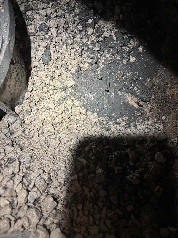 Inspected drainage system in unfinished basement area, documented PVC pipe installation and concrete substrate condition. Identified significant floor deterioration with visible cracking and fragmentation. Client has paid initial deposit, with additional work scheduled to address the drainage issues and restore damaged concrete surfaces.