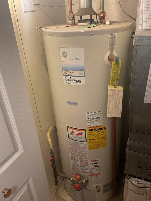 Performed assessment for proactive replacement of existing GE SmartWater unit with recommended 50-gallon Bradford White or Rheem Professional water heater (10-12 year warranty). Estimate includes removal and disposal of current unit, permit/inspection as required by Chicago code, new water supply flex connectors, new gas flex connector, and complete professional installation by licensed and insured technicians.