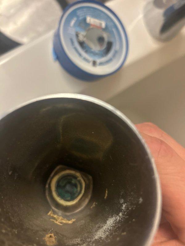 Responded to service call for shower repair. Removed corroded tub spout and replaced shower diverter valve which showed significant mineral buildup and internal corrosion. Additionally repaired sink drain to restore proper functionality.