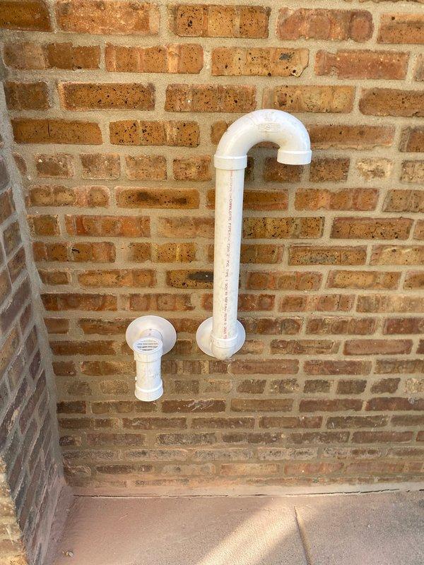 Responded to no hot water complaint. Installed new tanked water heater with Energy Star rating, complete with digital control panel and proper copper pipe connections. System includes pressure gauge and water filtration component, with all PVC drainage properly configured through existing brick wall.
