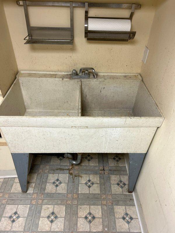 Installed new water shut-off valves for utility sink in basement location per customer request. Accessed existing plumbing configuration on wall, installed valves on water supply lines, and tested functionality to ensure proper operation with no leaks.