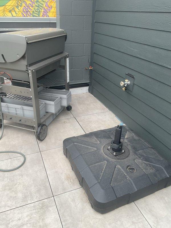 Installed two quarter-turn 1/2" valves on outdoor gas line to facilitate connection of customer's gas grill and fire pit. Performed pressure test to verify system integrity and absence of leaks. Confirmed proper operation of both appliances with stable gas flow and no safety concerns.