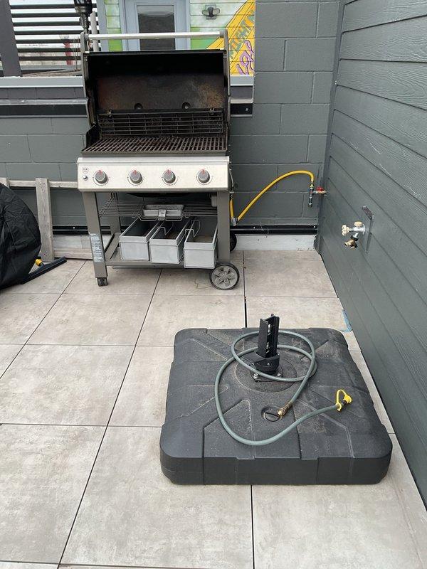 Installed two quarter-turn 1/2" valves on outdoor gas line to facilitate connection of customer's gas grill and fire pit. Performed pressure test to verify system integrity and absence of leaks. Confirmed proper operation of both appliances with stable gas flow and no safety concerns.