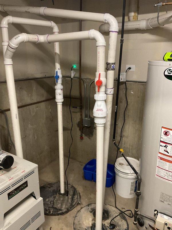 Responded to service call for water backup in basement shower. Inspected plumbing system in utility room, focusing on PVC pipe network and drain connections. Identified and cleared clog in main drainage line causing shower backup, restoring proper water flow throughout the basement plumbing system.