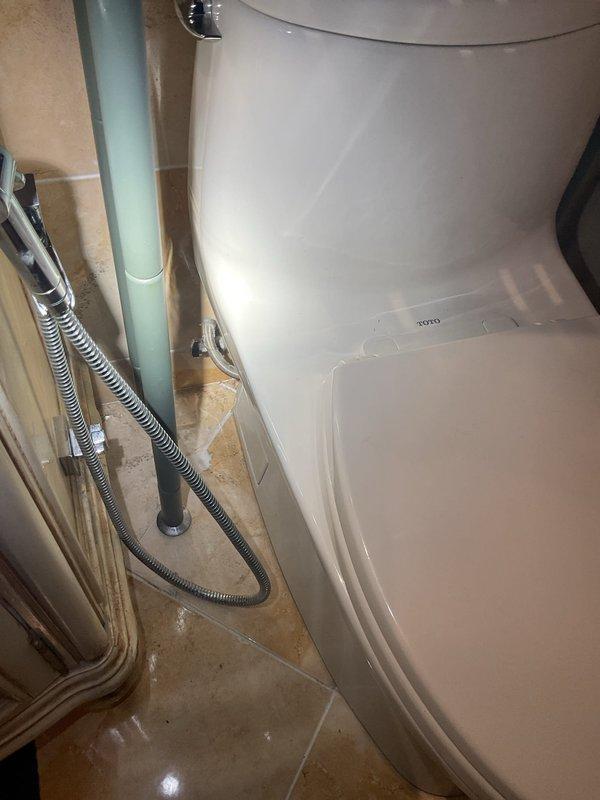 Installed two customer-provided bidet attachments to existing TOTO toilets, connecting them to the water supply lines using stainless steel braided hoses. Verified all connections for proper function and absence of leaks before completing the job.