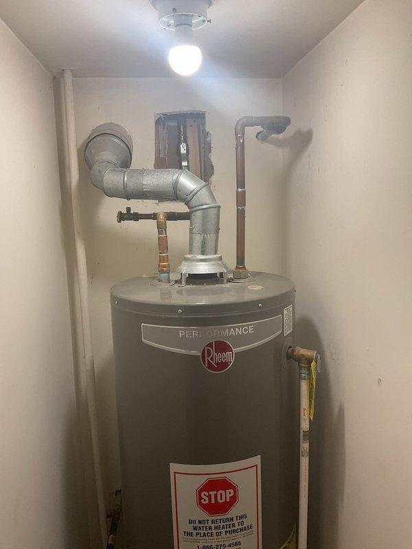 Performed inspection on 9-year-old Rheem Performance tanked water heater that was making cracking noises. Conducted full diagnostic assessment including examination of pressure relief valve, water connections, and heating elements. Flushed sediment from tank to address noise issues and improve efficiency, finding moderate calcium buildup consistent with unit's age. Recommended annual maintenance schedule to extend remaining service life, noting unit is approaching typical replacement timeline but currently functioning adequately.