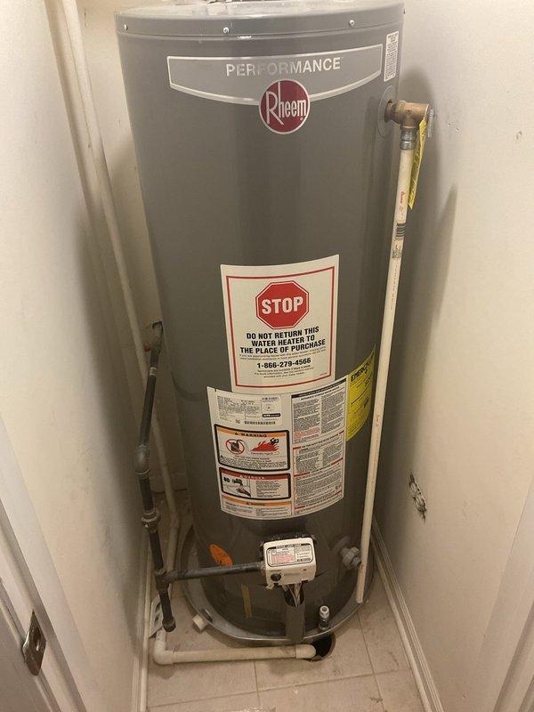Performed inspection on 9-year-old Rheem Performance tanked water heater that was making cracking noises. Conducted full diagnostic assessment including examination of pressure relief valve, water connections, and heating elements. Flushed sediment from tank to address noise issues and improve efficiency, finding moderate calcium buildup consistent with unit's age. Recommended annual maintenance schedule to extend remaining service life, noting unit is approaching typical replacement timeline but currently functioning adequately.