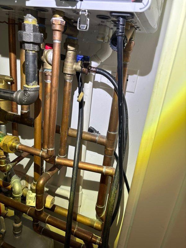 Conducted annual plumbing maintenance service on a complex water heating system, inspecting all copper piping, brass fittings, and control valves for proper operation. Checked pressure relief valve functionality and examined the entire installation for signs of leaks or deterioration, ensuring all components of the hydronic system remain in optimal working condition.