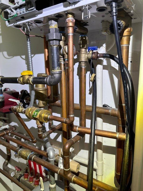 Conducted annual plumbing maintenance service on a complex water heating system, inspecting all copper piping, brass fittings, and control valves for proper operation. Checked pressure relief valve functionality and examined the entire installation for signs of leaks or deterioration, ensuring all components of the hydronic system remain in optimal working condition.