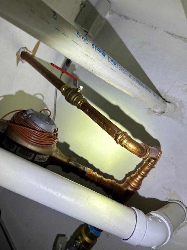 Conducted assessment of waste pump system, including inspection of copper and PVC pipe assembly with brass fittings and valves. Installation currently on hold pending city repairs to bbox; work will resume and balance will be collected upon job completion as approved by management.