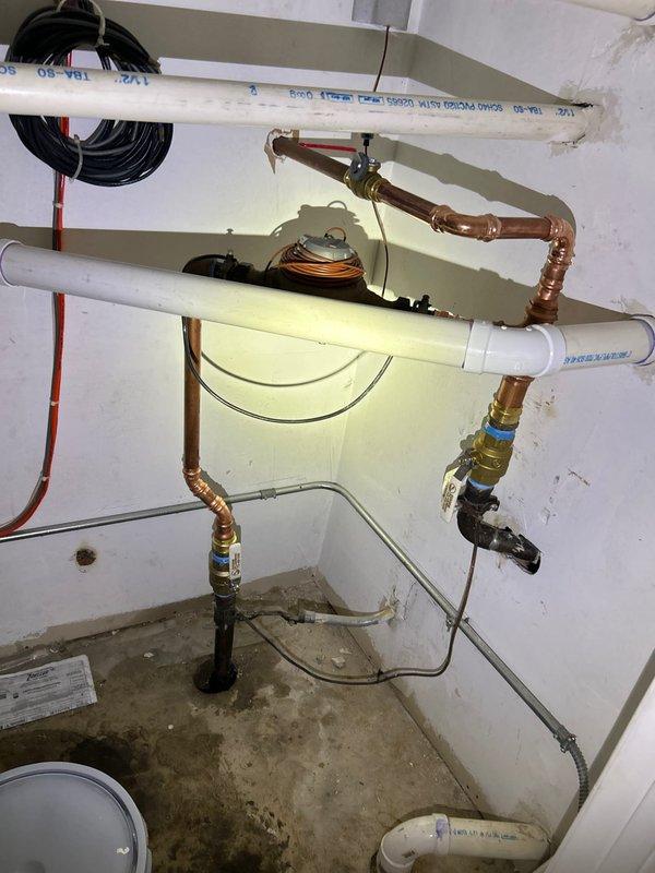 Conducted assessment of waste pump system, including inspection of copper and PVC pipe assembly with brass fittings and valves. Installation currently on hold pending city repairs to bbox; work will resume and balance will be collected upon job completion as approved by management.