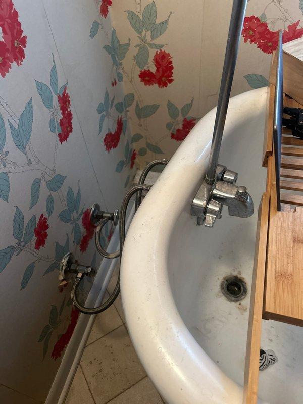 Responded to service call for kitchen faucet leak that customer attempted to repair unsuccessfully. Upon inspection, found bathroom sink installation with wall-mounted fixtures showing significant wear and deterioration at connection points. Replaced damaged washers and tightened loose fittings to resolve the leak, then verified proper water flow and drainage through the connected PVC waste system.