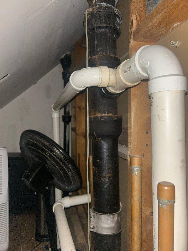 Responded to service call for kitchen faucet leak that customer attempted to repair unsuccessfully. Upon inspection, found bathroom sink installation with wall-mounted fixtures showing significant wear and deterioration at connection points. Replaced damaged washers and tightened loose fittings to resolve the leak, then verified proper water flow and drainage through the connected PVC waste system.