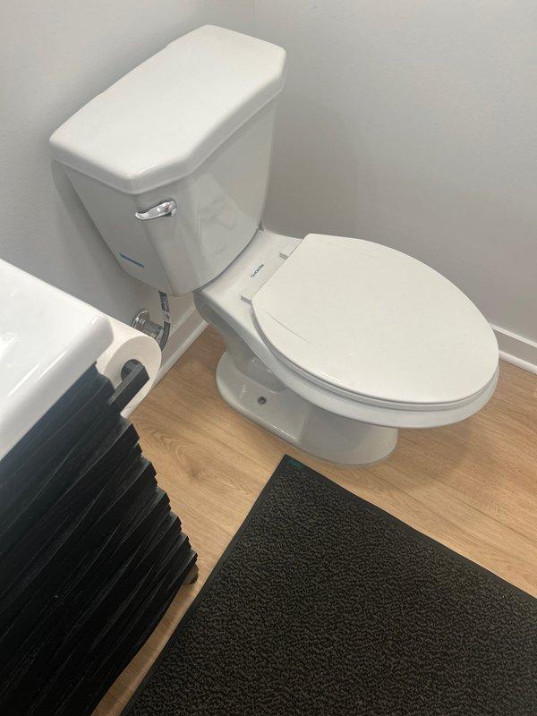 Responded to service call for water pooling under floating basement floor in a 125-year-old home. Performed main drain cleanout to resolve drainage issue that had been causing localized water accumulation for approximately two weeks. Inspected bathroom fixtures and supply lines; all components were found to be in normal working condition with no visible leaks.
