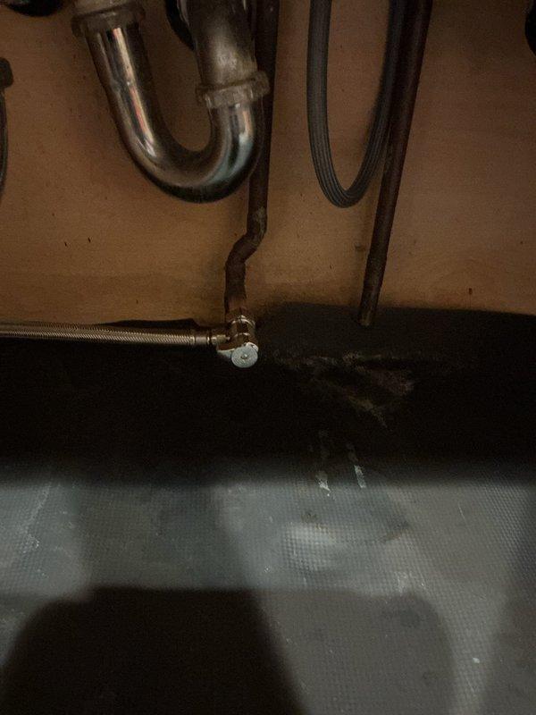 Responded to service call for leak under kitchen sink at dishwasher connection. Inspected the plumbing system, including P-trap and supply lines, and identified water damage on the wall near the connection point. Repaired the leaking dishwasher hookup by replacing the damaged fitting and tested the system to confirm proper function with no further leakage.
