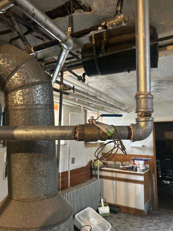 Responded to service call regarding water heater making loud popping sounds. Inspection revealed significant corrosion and mineral buildup on the pump assembly connected to the water heater. Customer approved full payment for replacement pump, which will be ordered, and customer will be notified when parts arrive.