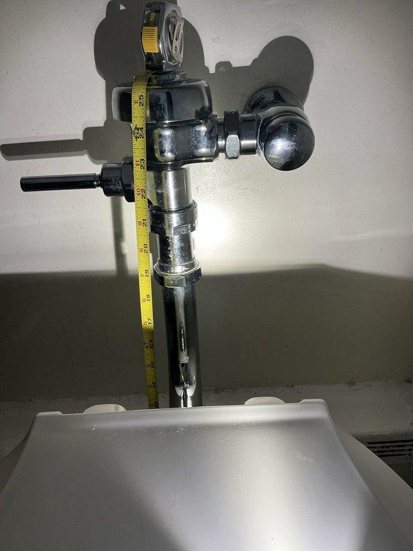 Performed follow-up service on previously rebuilt Sloan flush valve that was not filling adequately for proper flushing. Diagnosed insufficient water volume in valve assembly, adjusted water supply and calibrated flush cycle to ensure proper bowl evacuation. Verified proper operation with multiple test flushes.