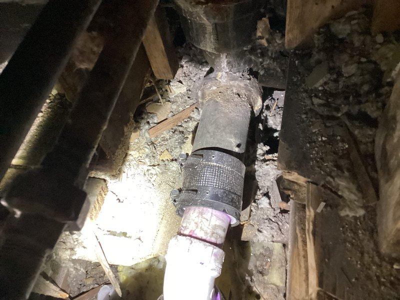 Inspected slow-draining bathtub issue reported by customer under previous P-trap replacement warranty. Examination revealed debris accumulation in drain line rather than P-trap malfunction. Cleared blockage and verified proper drainage functionality with water flow test.