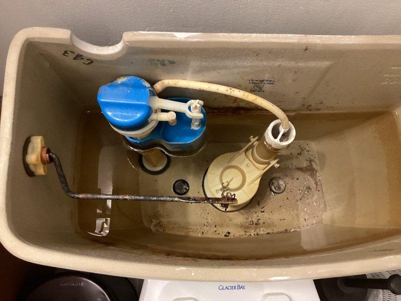 Diagnosed and repaired running toilet in second bathroom by replacing worn flapper valve and adjusting fill valve assembly in Glacier Bay toilet tank that showed significant mineral buildup. Inspected and addressed slow leak in main bathroom sink by tightening loose P-trap connection and checking supply lines for proper function.