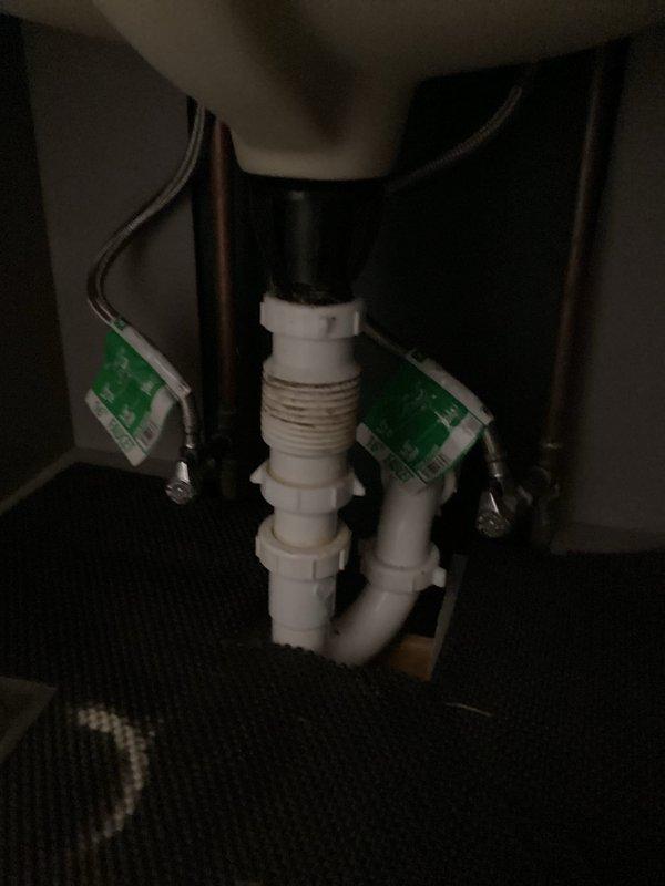 Diagnosed and repaired running toilet in second bathroom by replacing worn flapper valve and adjusting fill valve assembly in Glacier Bay toilet tank that showed significant mineral buildup. Inspected and addressed slow leak in main bathroom sink by tightening loose P-trap connection and checking supply lines for proper function.