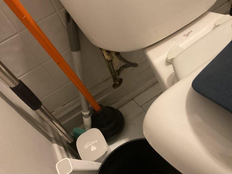 Diagnosed and repaired continuously running toilet in upstairs bathroom that was failing to properly evacuate waste. Removed significant mineral buildup from internal tank components and replaced deteriorated flush valve assembly, restoring proper flushing functionality and eliminating water waste.