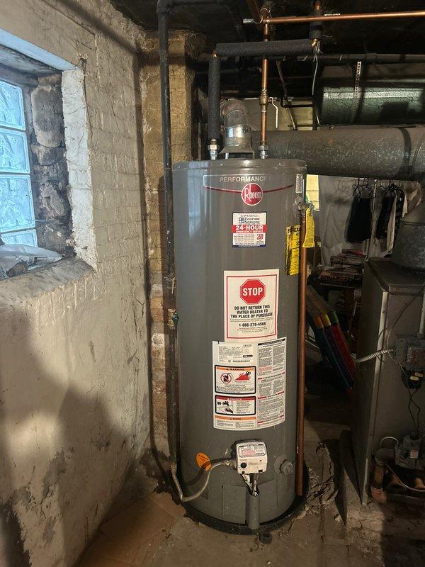 Responded to same-day service request for a leaking water heater. Successfully replaced customer's existing Bradford White unit with a new 50-gallon atmospheric Rheem water heater. Installation included proper connection of copper supply lines and verification of system functionality.