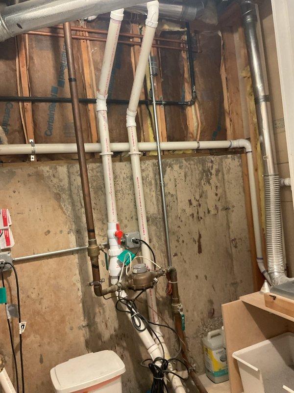 Completed camera inspection of residential plumbing system to assess clogged drain. Identified a possible venting issue in the PVC drainage configuration, particularly in the basement utility area where multiple 90-degree bends were observed. Recommended follow-up service with a technician for further investigation and resolution of the venting problem.