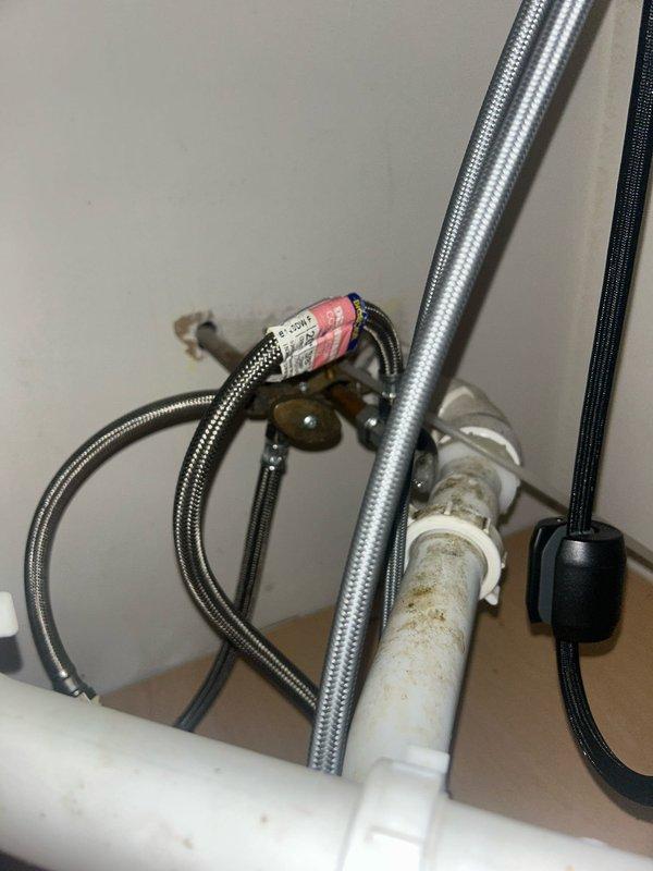 Responded to service call for low hot water pressure affecting kitchen faucet and dishwasher. Diagnosed issue with mineral deposits restricting flow in hot water supply lines. Cleaned and flushed affected supply lines, inspected braided hoses for damage, and verified equal pressure between hot and cold lines after service.
