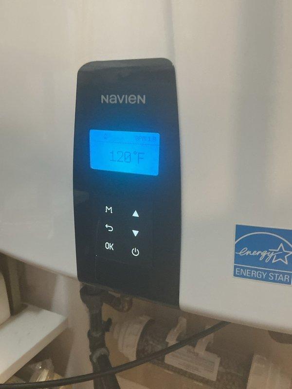 Performed VIP maintenance service on Navien tankless water heater system. Inspected gas connections and identified source of gas odor at pipe fitting, which was tightened to eliminate leak. Located and cleared brown water discharge issue by flushing sediment from system and verifying proper temperature setting (120°F). All connections, valves, and venting were checked for proper operation and compliance with manufacturer specifications.